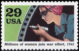 Woman with drill (millions of women join war effort)