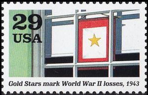 Banner in window (Gold Stars mark World War II losses)