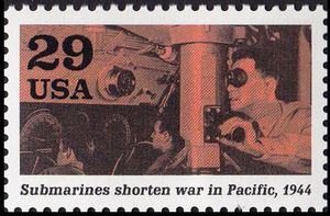 Officer at periscope (Submarines shorten war in Pacific)